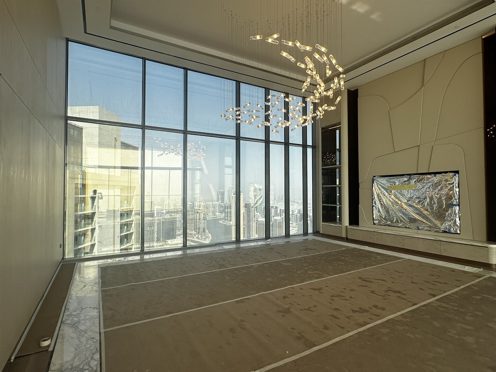Floor-to-ceiling glass wall in a Dubai apartment